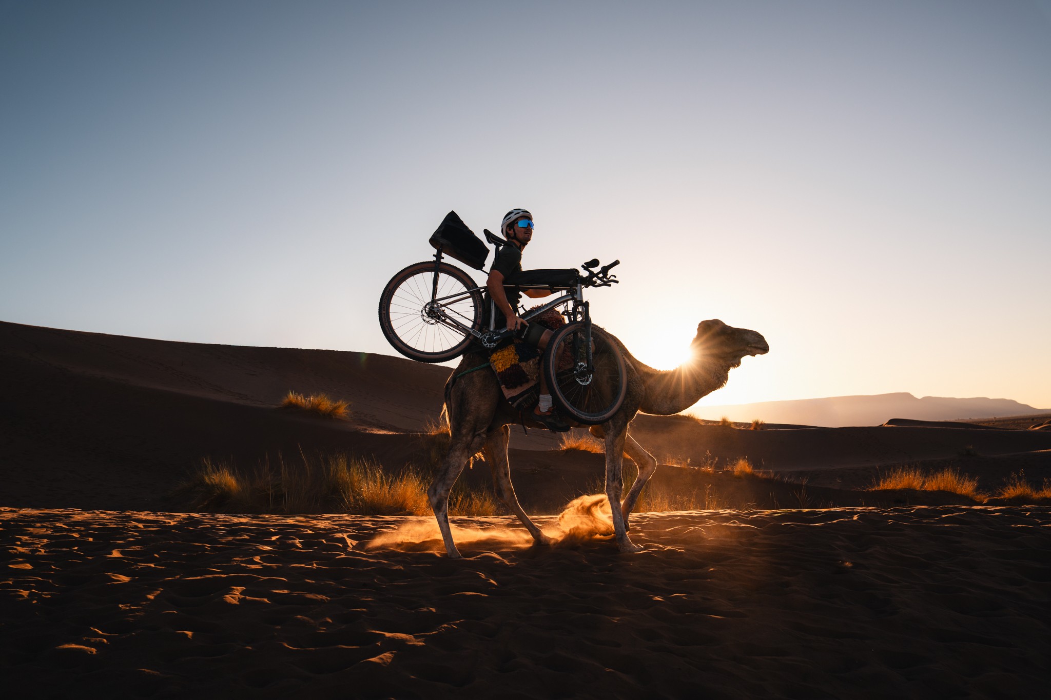 Loaded bikes at sunset in the Sahara