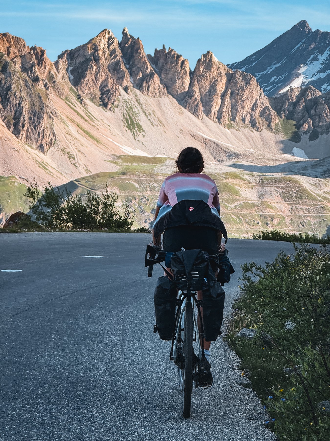 High-altitude lake and peaks on the Alps route