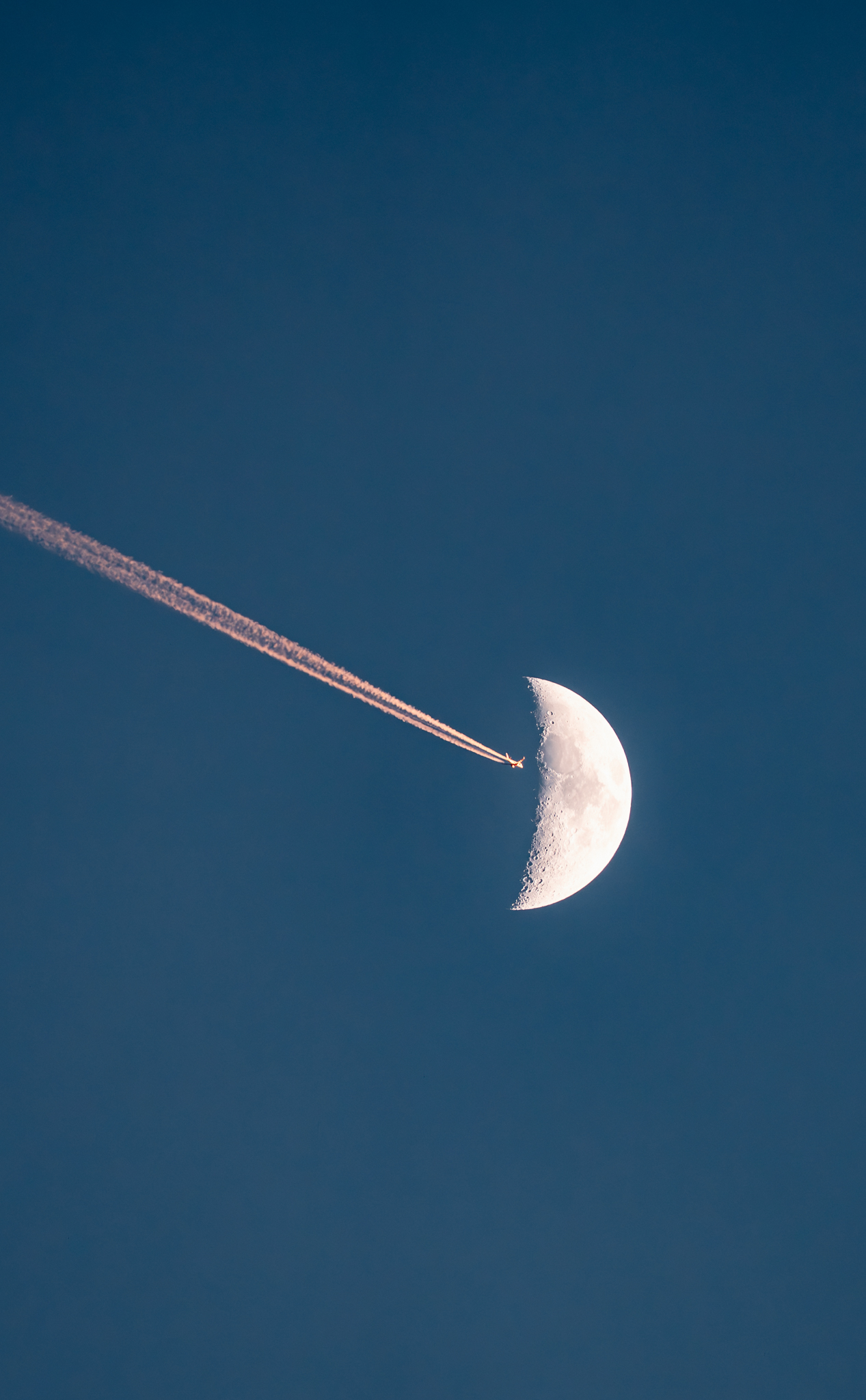 Crescent moon in a blue sky