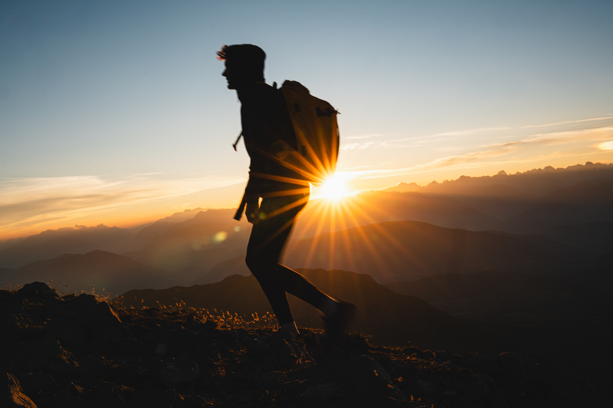 Hiker silhouette at sunrise