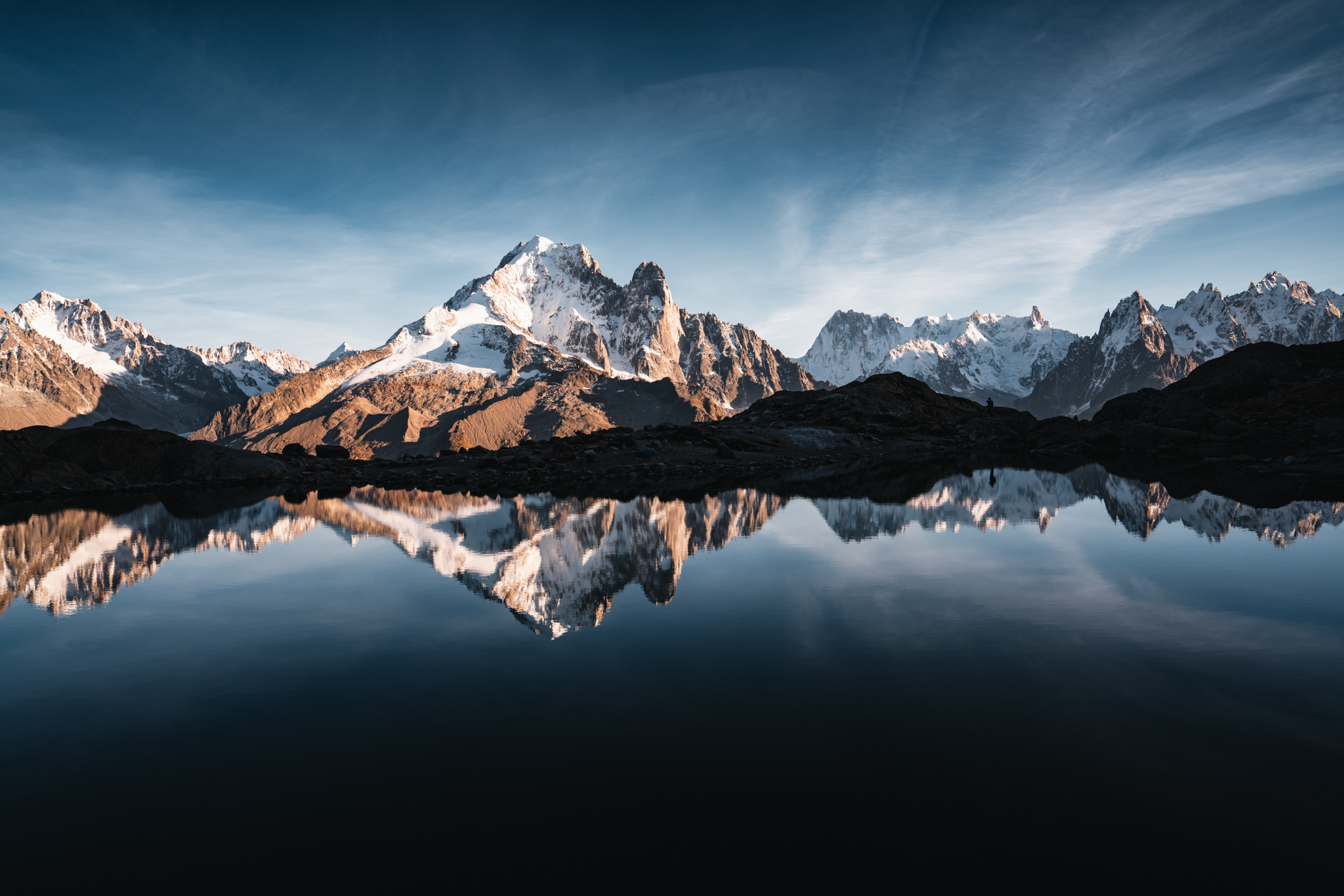 Snowy peaks reflected in a lake